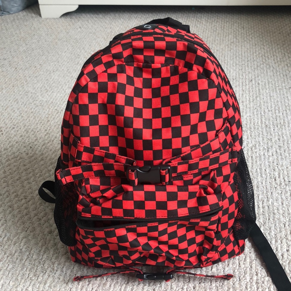 Red and black checkered backpack